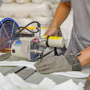 Workers manufacturing microfiber towels