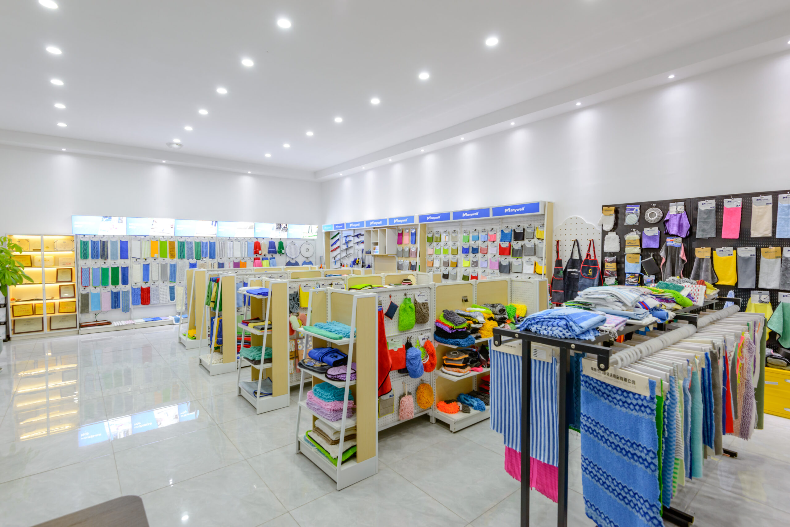 Various-towels,-mops,-and-Mop-bucket-are-placed-together.